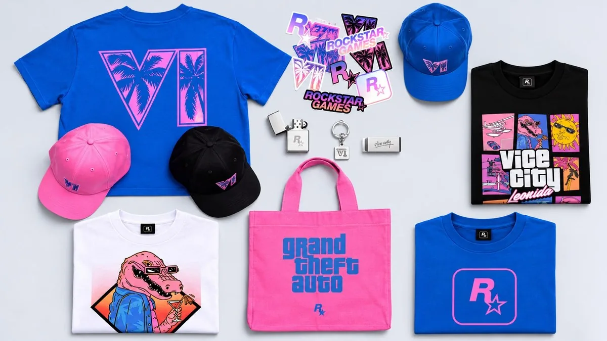 Official GTA 6 merchandise collection flat lay — t-shirts, caps, tote bag, lighter and accessories